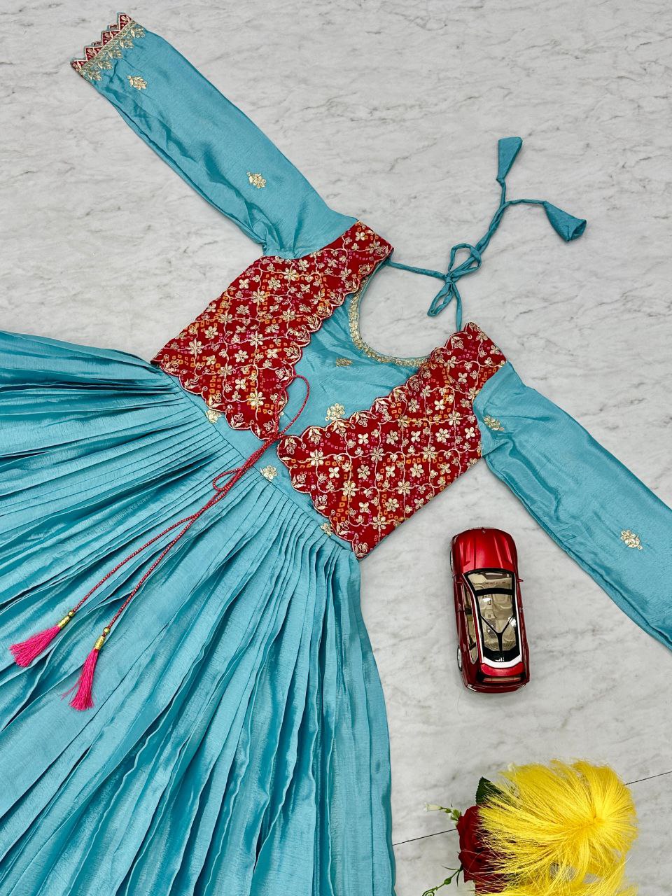 Glamorous Launch: Bandhej Elegance Gown with Chic Attached Shrug