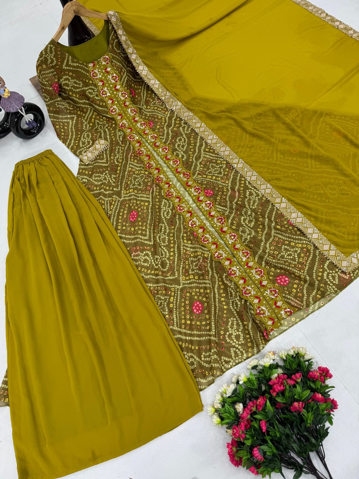 Elegant Faux Georgette Fancy Cut Top & Plazzo Suit Set with Embroidery & Sequins Work