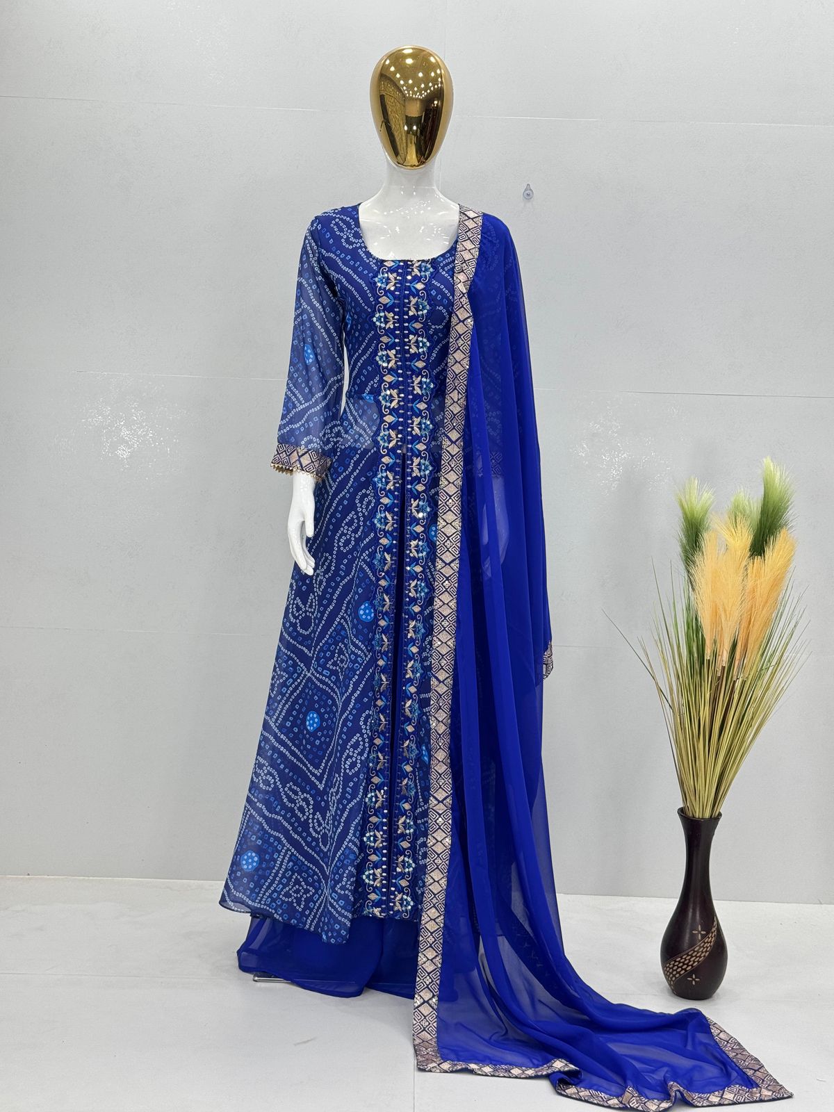 Elegant Faux Georgette Fancy Cut Top & Plazzo Suit Set with Embroidery & Sequins Work