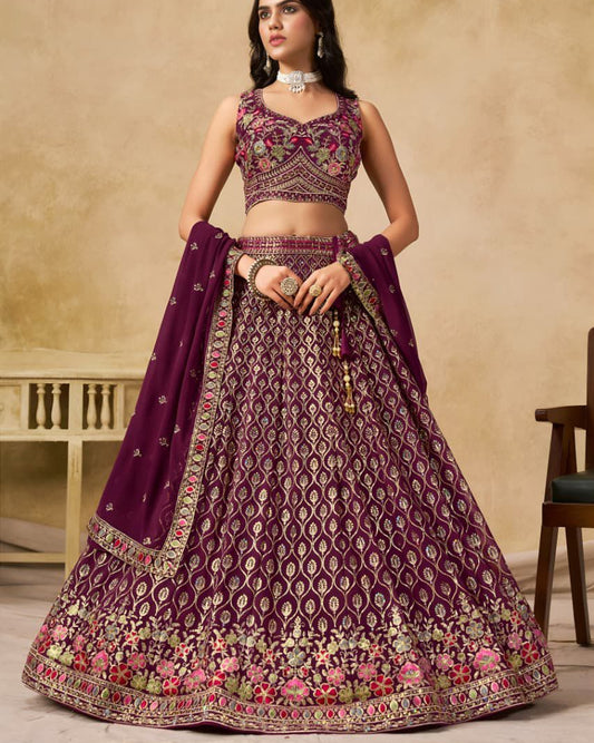 Woman wearing a traditional purple embroidered outfit with a beige background