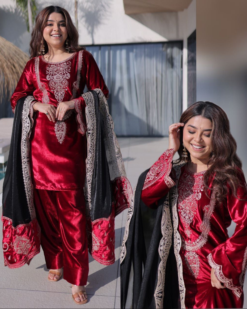 Two women wearing red and black traditional outfits with embroidery, standing outdoors.